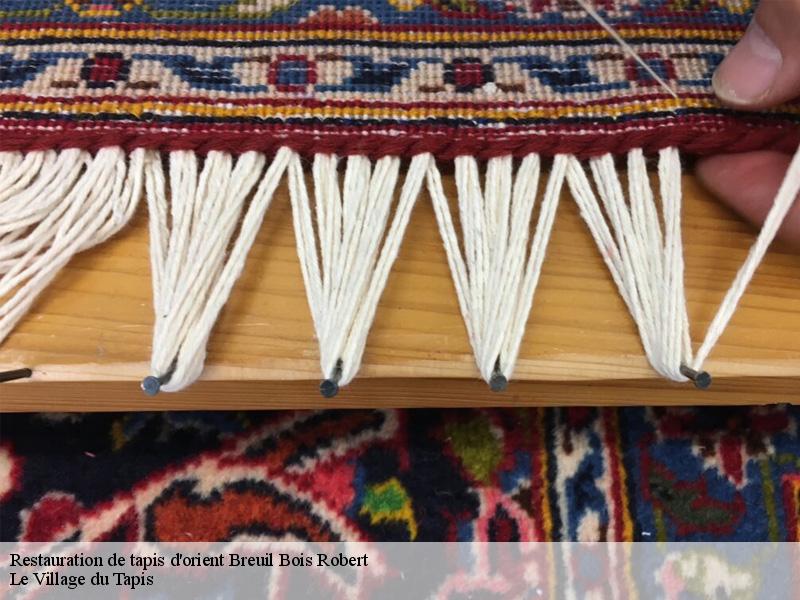 Restauration de tapis d'orient breuil-bois-robert-78930 Le Village du Tapis